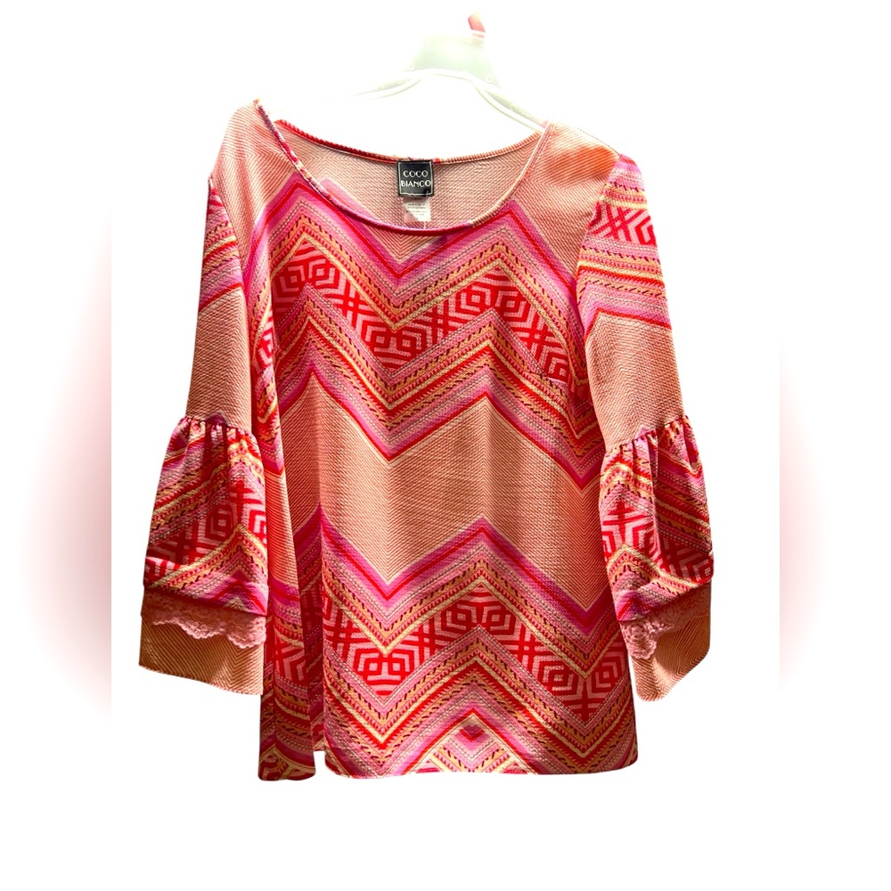 Coco Bianco women's knit top with a chevron pattern and bell sleeves.